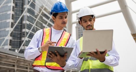 two men working on a construction site